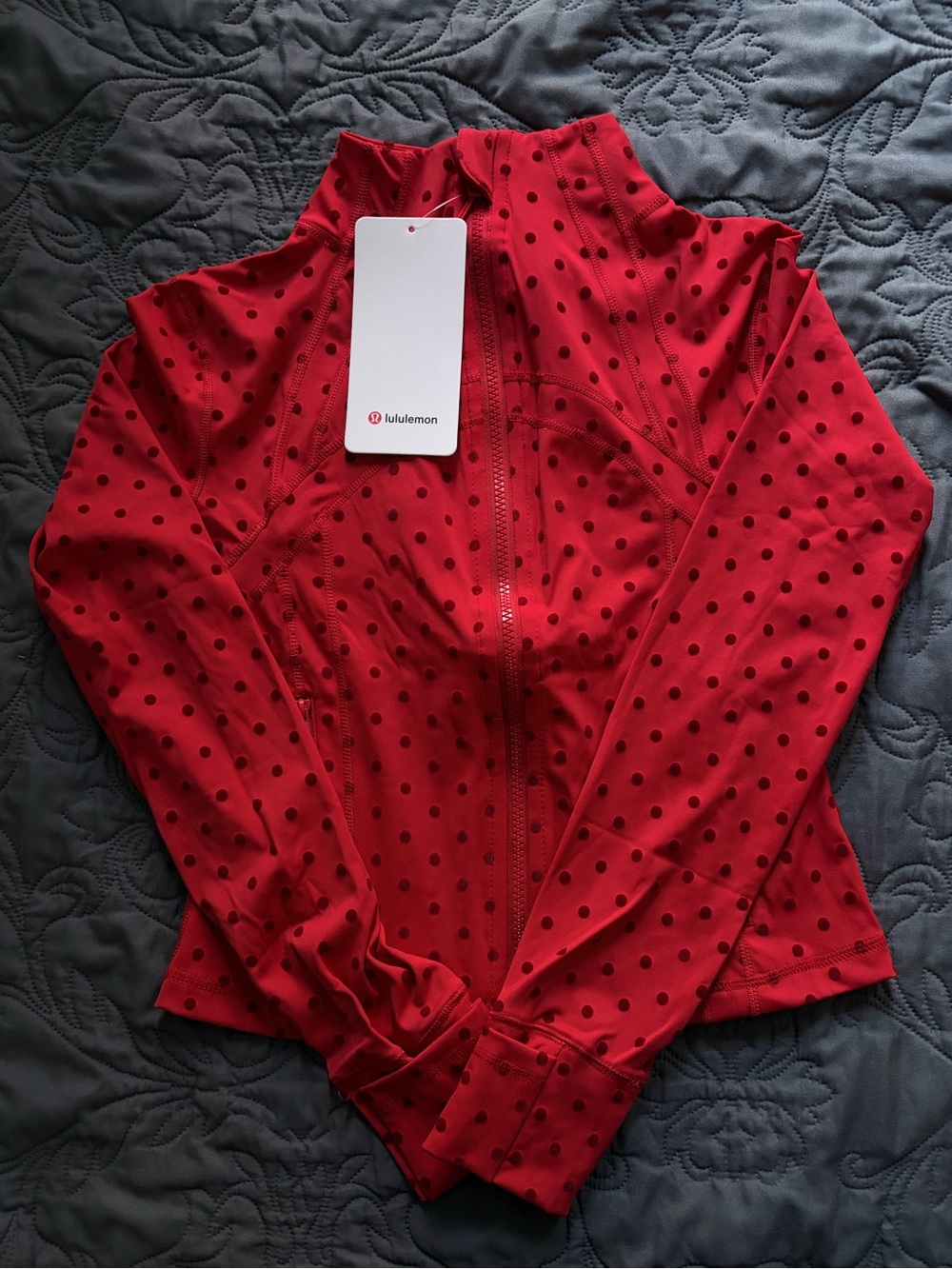 Cropped lululemon define jacket in red with polka dots